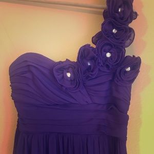 Long purple dress with rhinestones